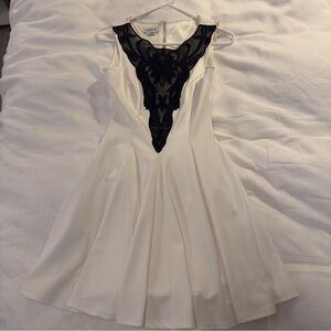bebe Cream Mini Dress with Black Lace